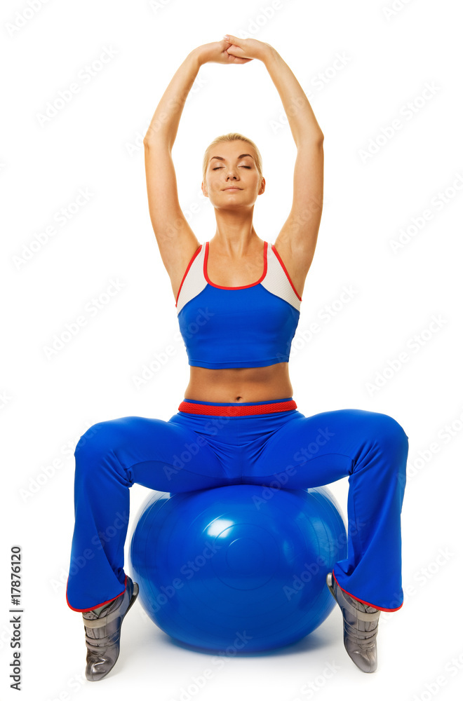 Young woman doing exercise on a fitness ball Young woman doing exercise on a fitness ball