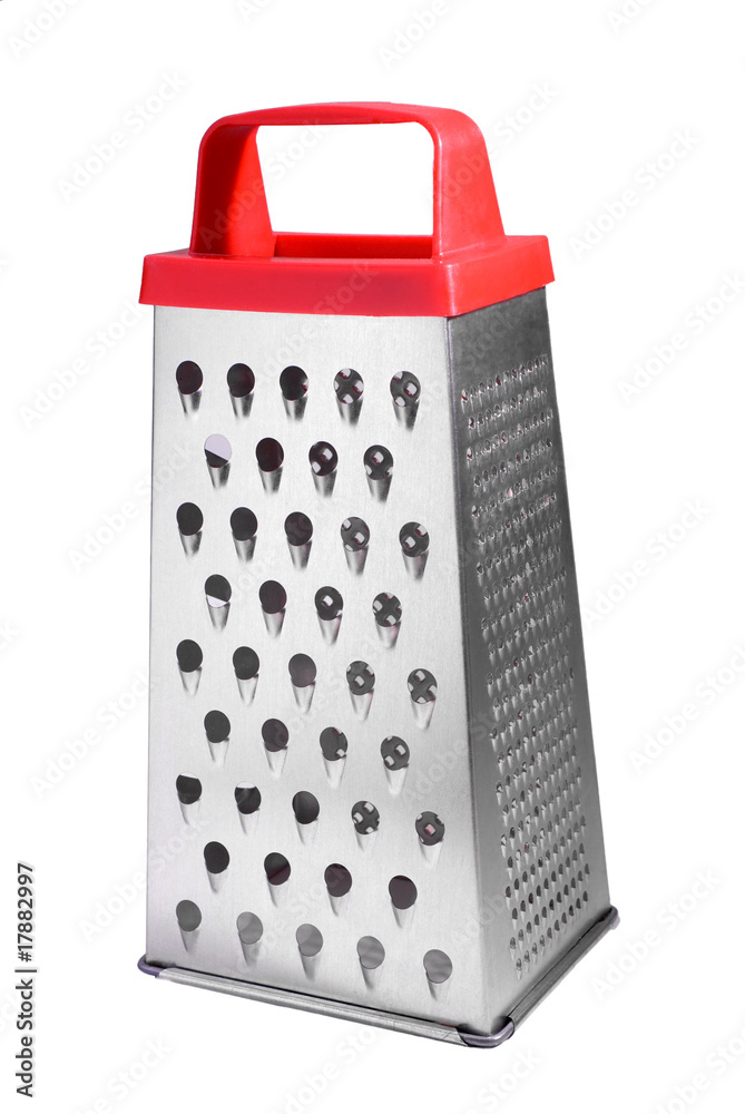 Grater with red handle isolated over white Grater with red handle isolated over white