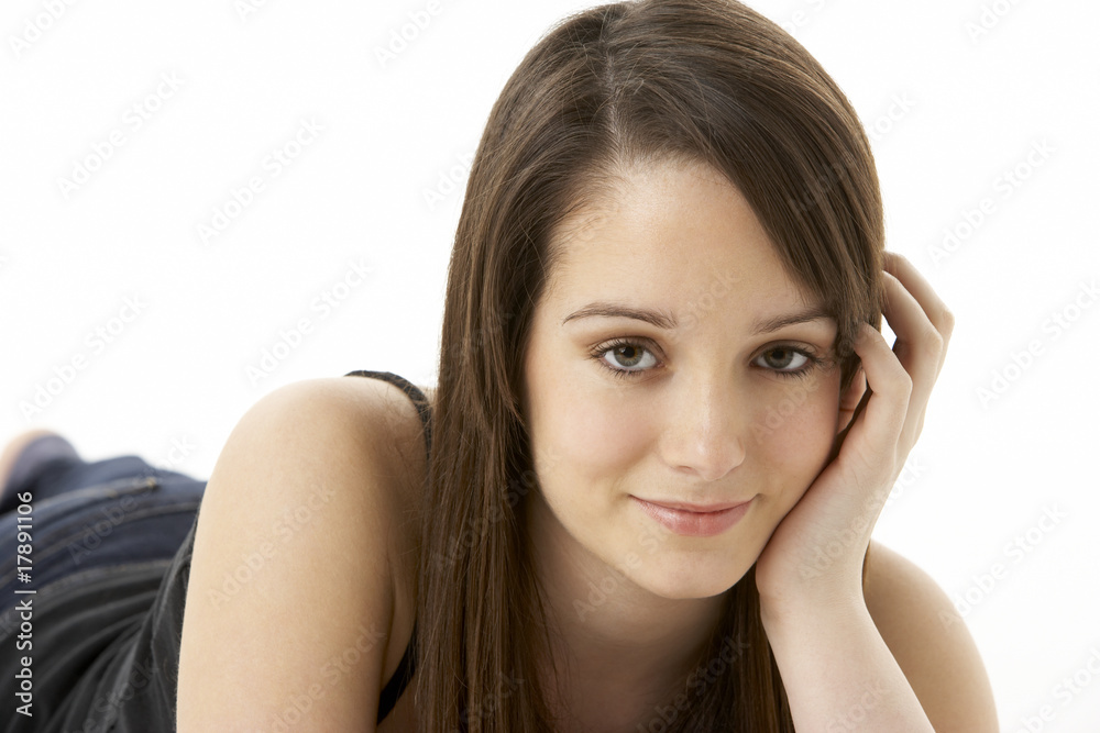 Studio Portrait Of Teenage Girl On White Background Studio Portrait Of Teenage Girl On White Background