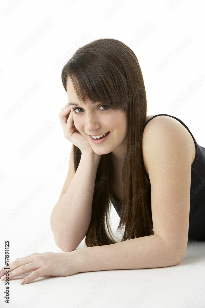 Studio Portrait Of Teenage Girl On White Background Studio Portrait Of Teenage Girl On White Background