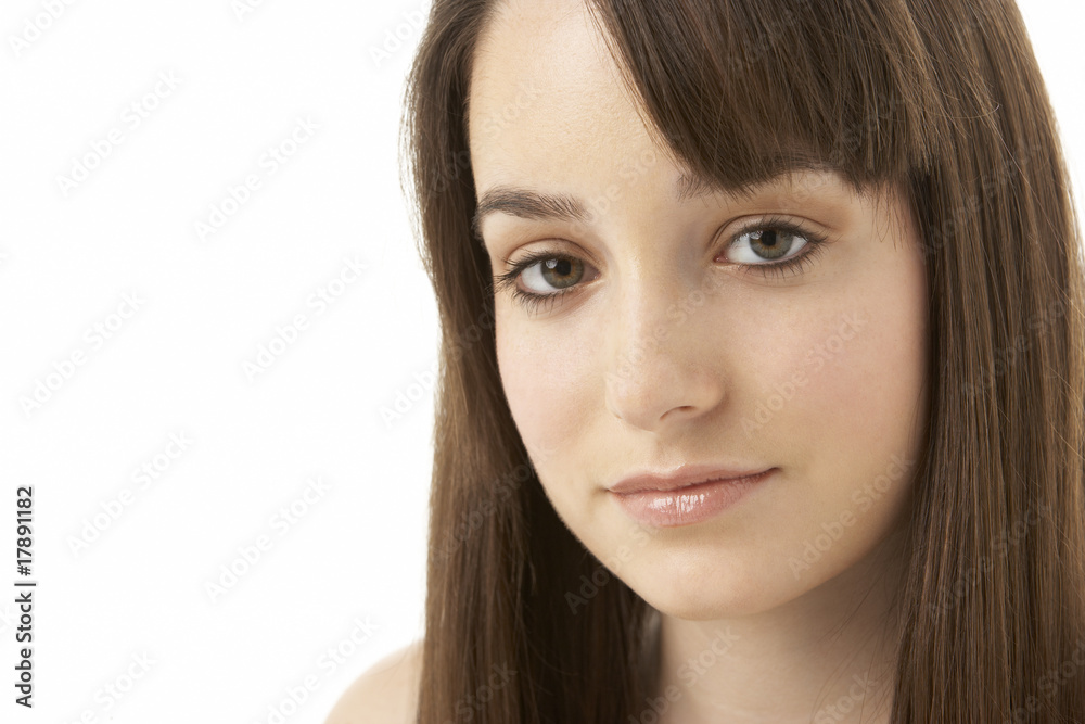 Studio Portrait Of Teenage Girl On White Background Studio Portrait Of Teenage Girl On White Background