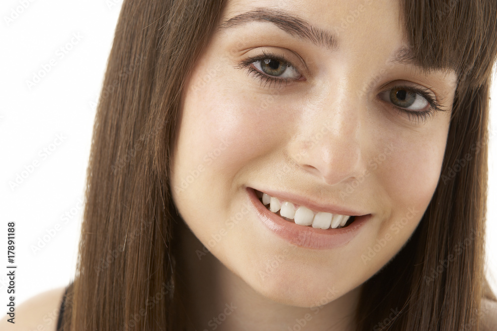 Studio Portrait Of Teenage Girl On White Background Studio Portrait Of Teenage Girl On White Background