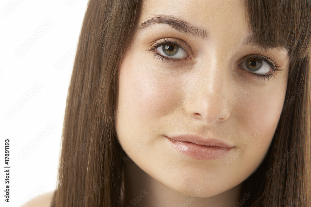 Studio Portrait Of Teenage Girl On White Background Studio Portrait Of Teenage Girl On White Background