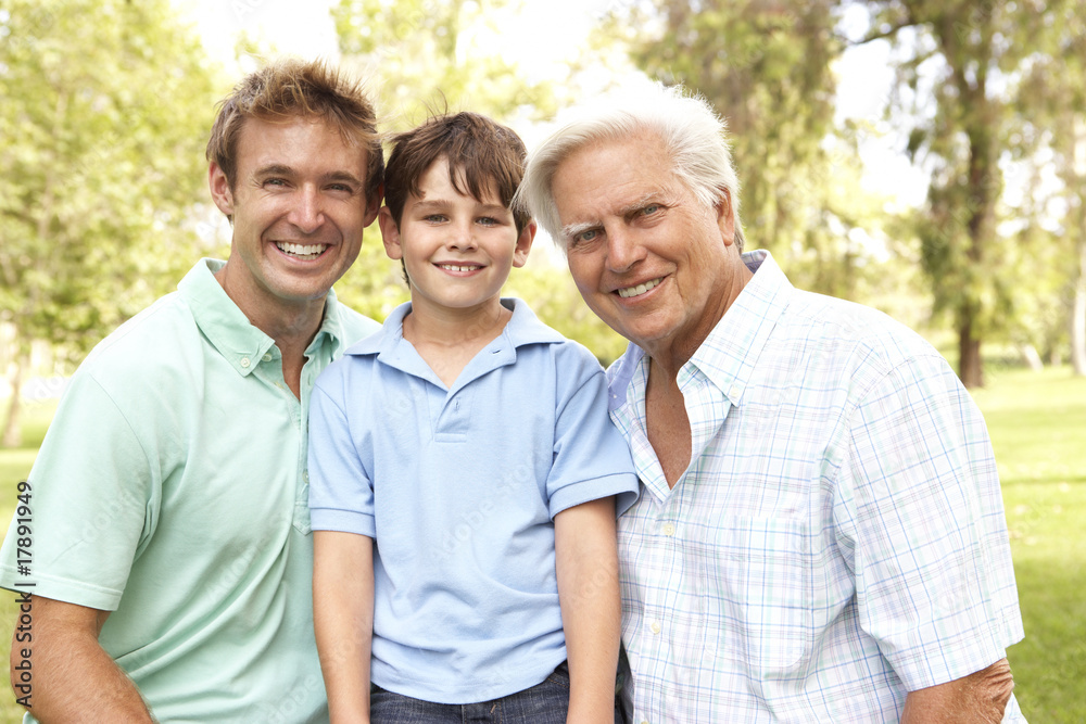 Obraz premium Grandfather With Father And Son In Park