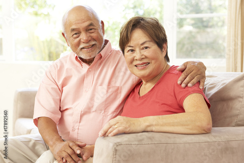 Senior Couple Relaxing At Home Together