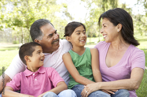 Grandparents In Park With Grandchildren