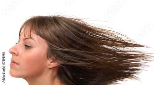 Portrait of the girl going against a wind