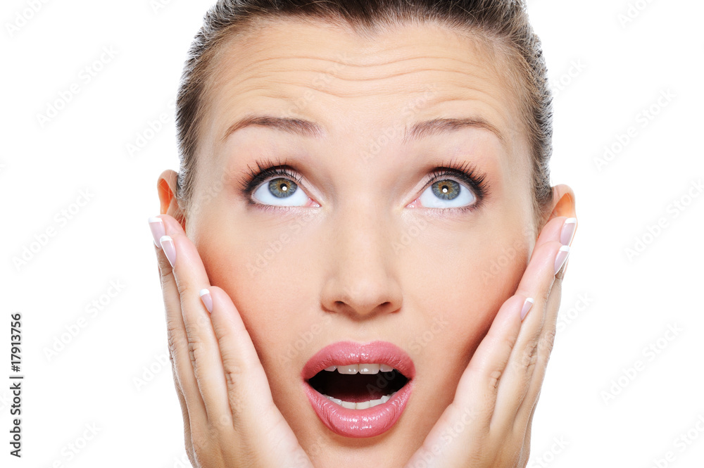 woman with an astonishment emotion on her face woman with an astonishment emotion on her face