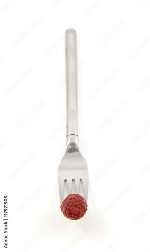 fresp raspberry on fork over white background fresp raspberry on fork over white background
