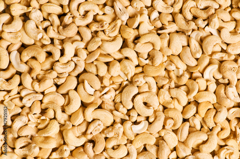 Cashew nuts arranged at the background