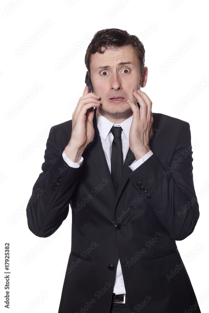 afraid looking businessman with a phone afraid looking businessman with a phone