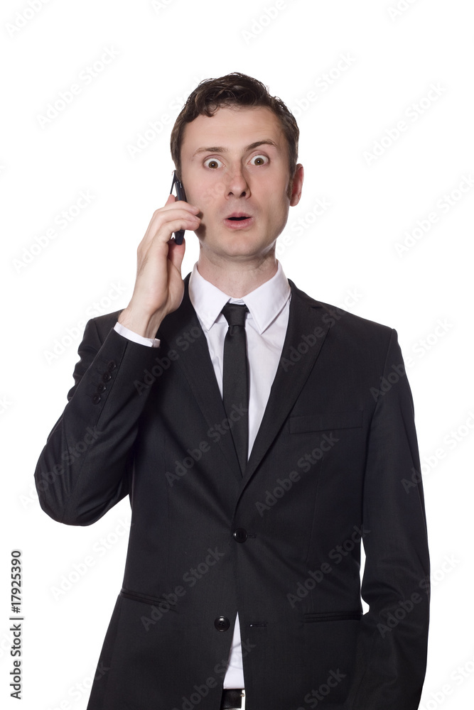 surprised businessman with a mobile surprised businessman with a mobile