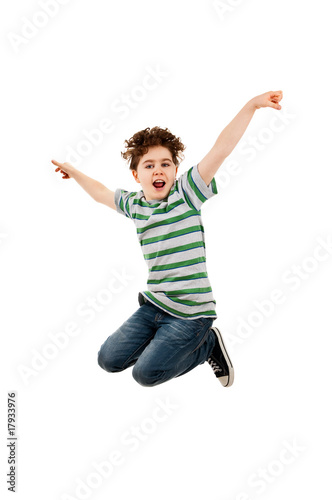 Boy jumping isolated on white background