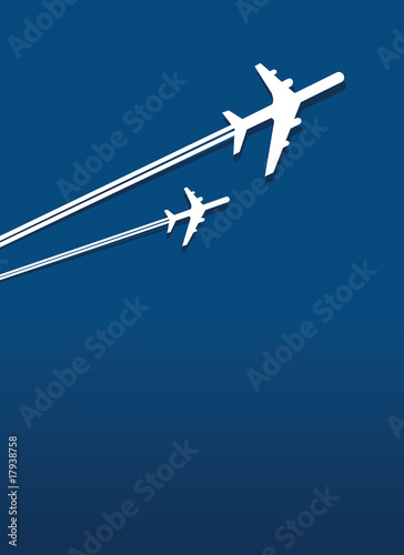 two planes in flight across the sky