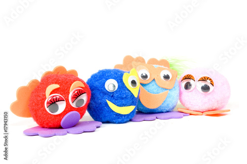 curious little dolls are looking to you