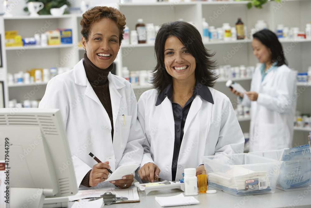 Portrait of female pharmacists in pharmacy Portrait of female pharmacists in pharmacy