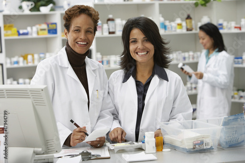 Portrait of female pharmacists in pharmacy photo
