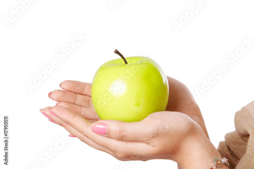 green apple in hands