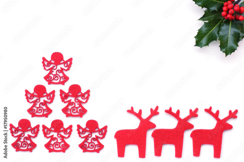 Christmas background with holly and reindeer
