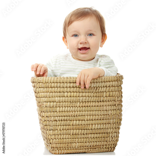 Young baby girl in basket