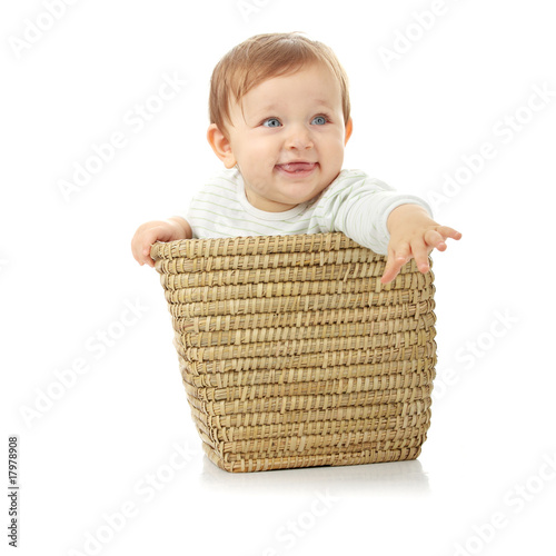 Young baby girl in basket