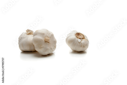Cloves of garlic on white
