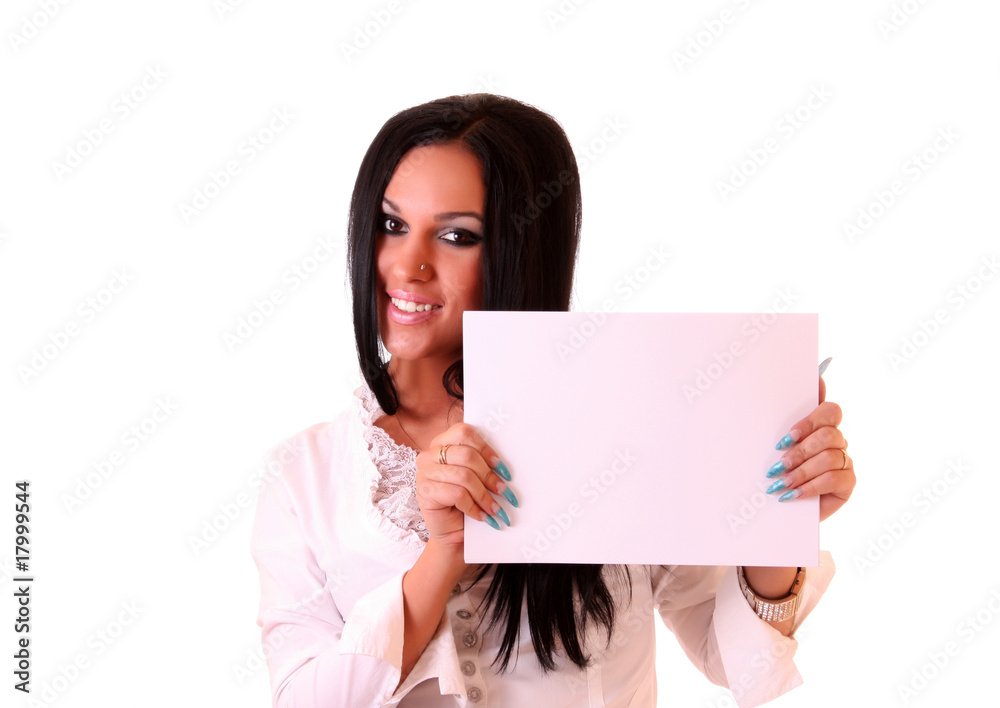 Portrait of a beautiful young brunette woman holding a blank bi Portrait of a beautiful young brunette woman holding a blank bi