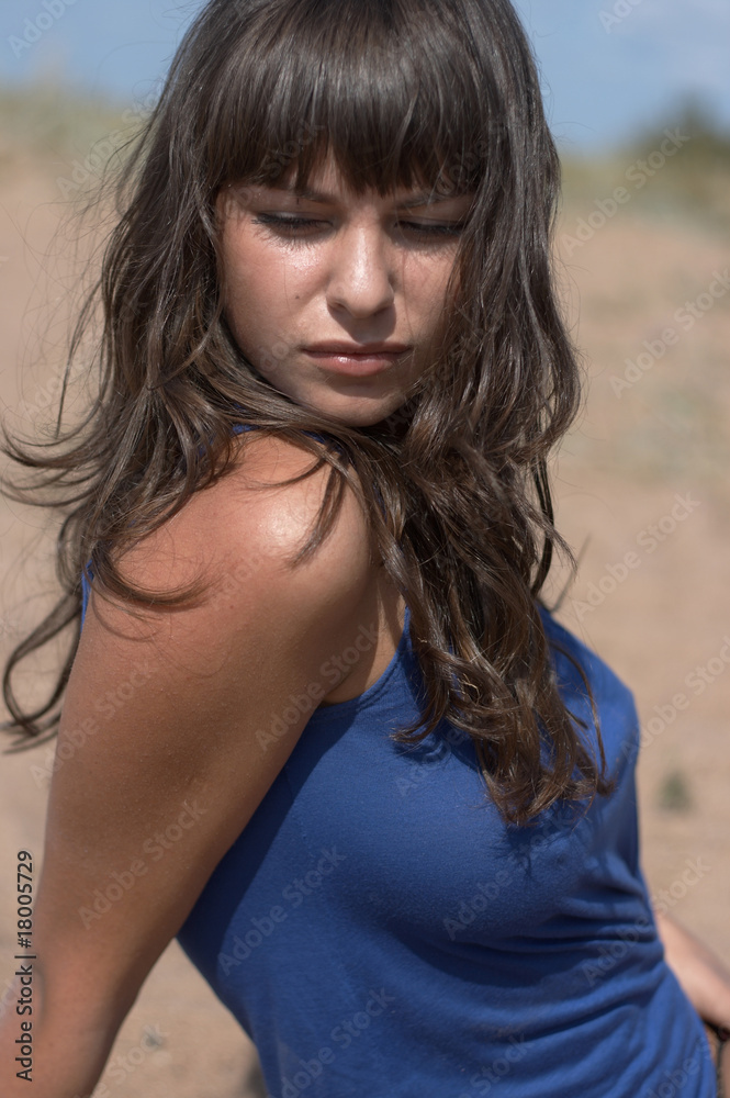 The sexual girl in a dark blue dress The sexual girl in a dark blue dress