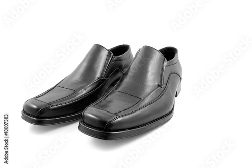 Pair of black shiny men shoes over white background