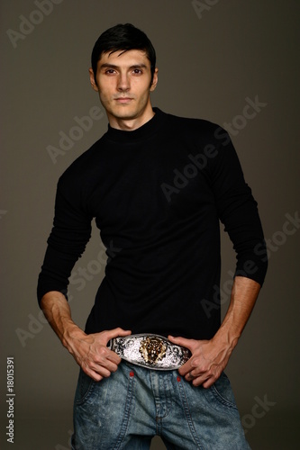 Model with large belt buckle