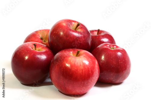 Juicy, ripe, red apples on a white background.