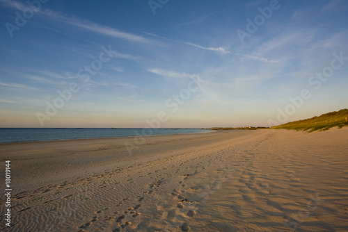 view of a beach before sunset