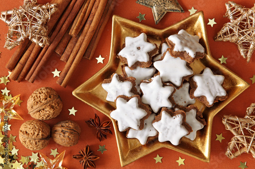 Christmas cakes on brown tablecloth photo