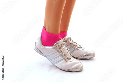 sport footwear on woman legs