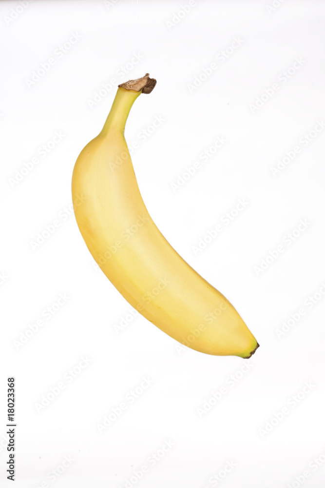 One ripe yellow banana isolated on white One ripe yellow banana isolated on white