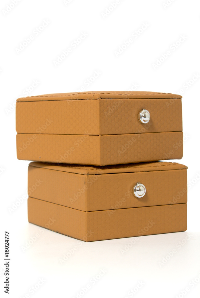 two brown boxes for jewelry