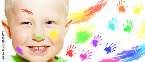 Happiness young smiles boy and color hands photo