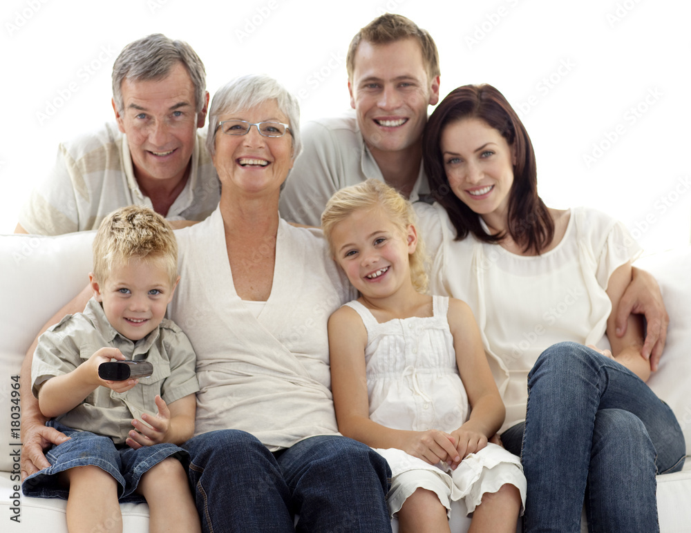 Happy family watching television in living-room