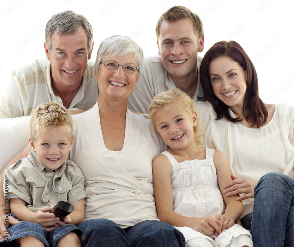 Family watching television at home