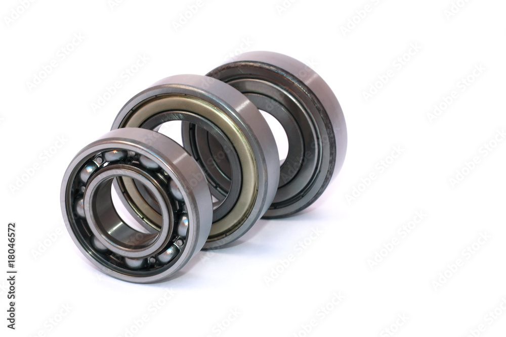 Three ball bearings ordered isolated on white background Three ball bearings ordered isolated on white background