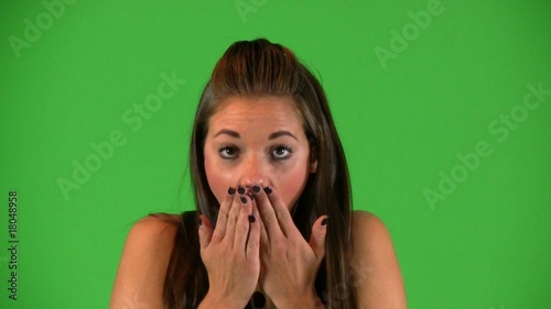 Young woman doing facial expressions