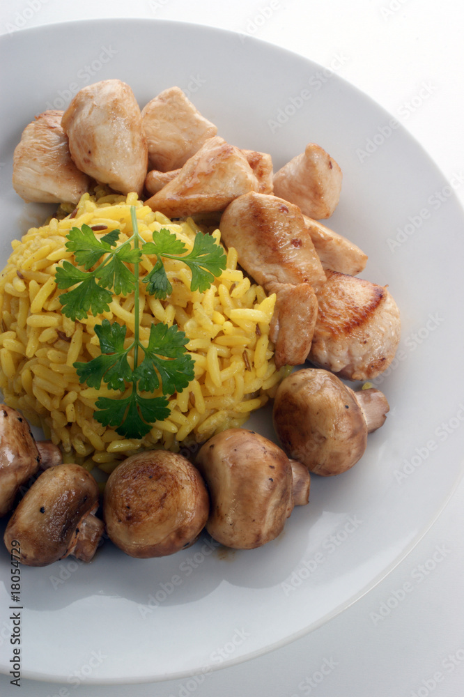 organic rice on a plate with pork goulash organic rice on a plate with pork goulash