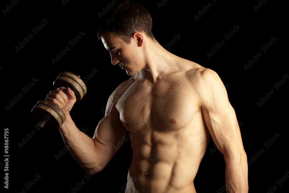 Sexy Muscular Man with Dumbells