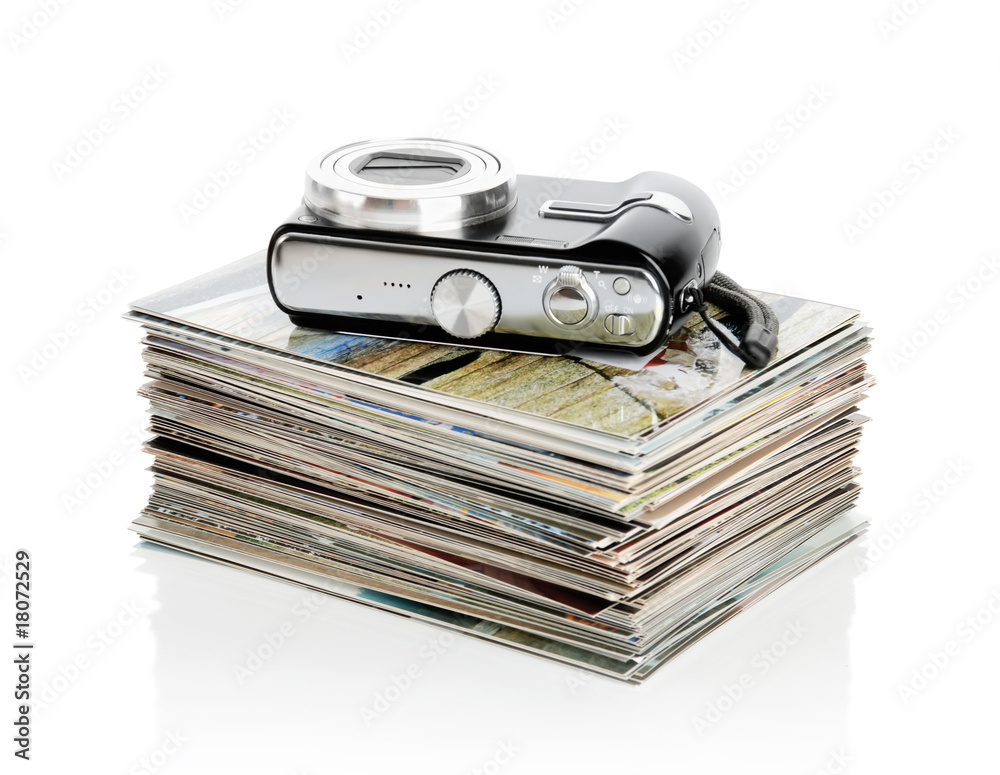 The digital camera and the heap of photos The digital camera and the heap of photos