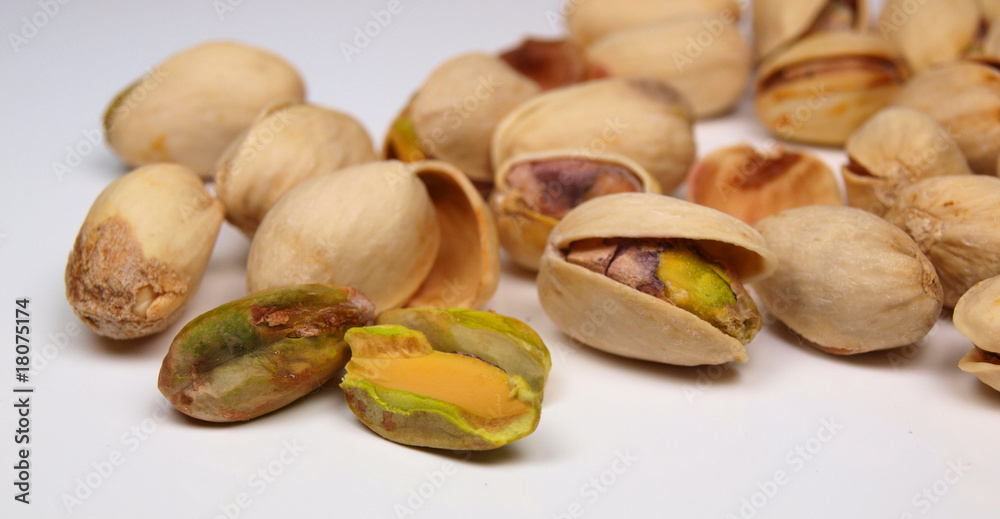 Pistachio nuts isolated on white Pistachio nuts isolated on white