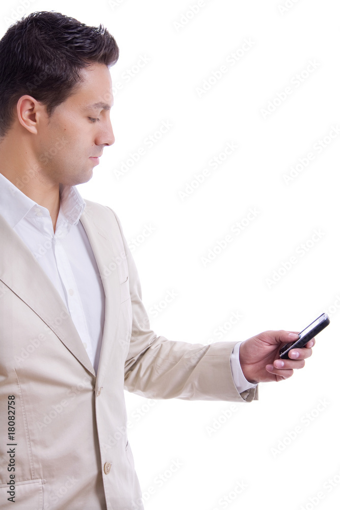 Young business man using cellphone isolated on white background Young business man using cellphone isolated on white background