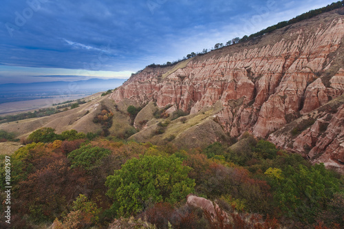 Red rocks in canyon in the fall and blue sky