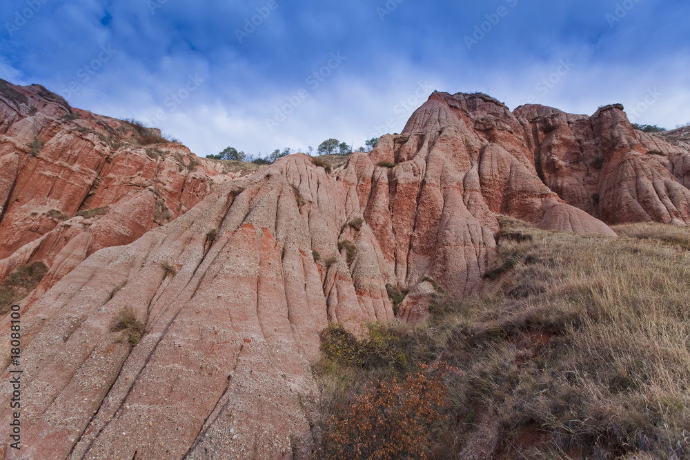 Red rocks in canyon and blue sky