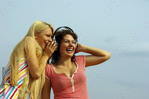Girl listening to music with headphones