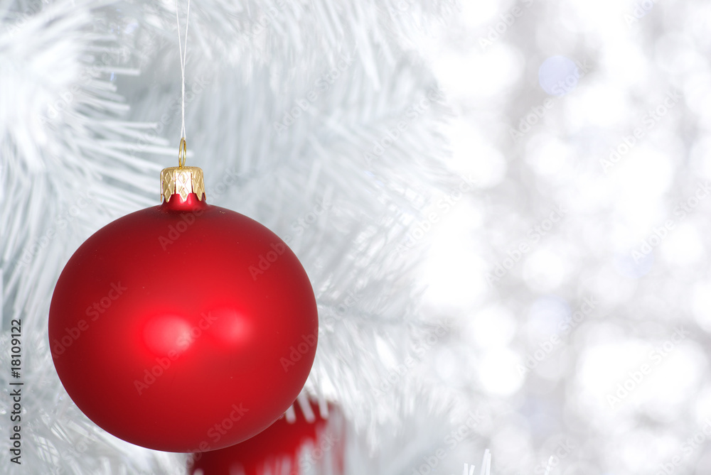 Red balls - Christmas decoration on silver bokeh Red balls - Christmas decoration on silver bokeh